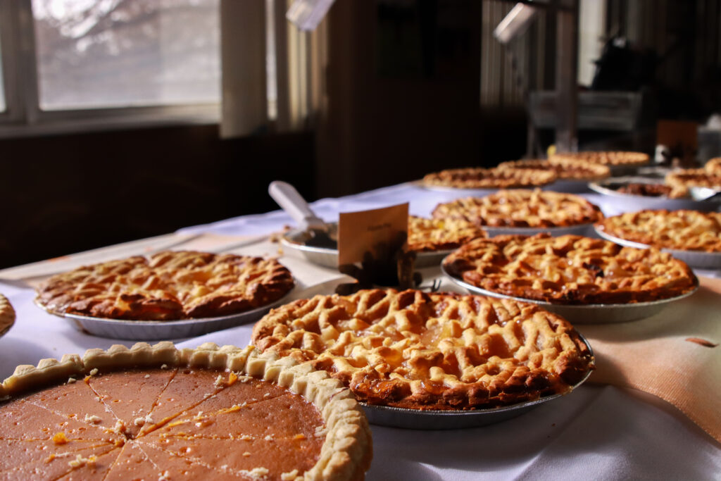 Pictures of pie made by the Dining Services laid out for Thanksgiving
