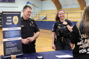 McPherson police department talks to Central student at Career Fair