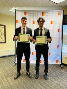 Two Future Business Leader students pose with their awards. 