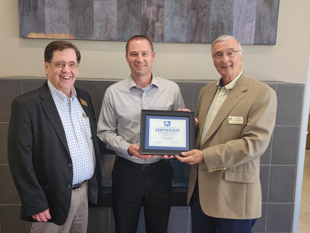 Emprise Bank Chet Lang awarded Business of the Quarter by Dr. David Ferrell and Joe Johnston